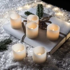 6 Wax Battery LED Votive Candles 6 6 Wax Battery LED Votive Candles -Holiday Decor Shop CA13855 6 Wax Votive Battery Candle Tea Lights Christmas Snow P1