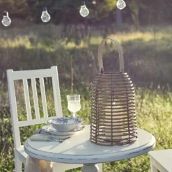 Rattan Wooden Lantern With TruGlow® Candle -Holiday Decor Shop LA21002 Rattan Wooden Lantern TruGlow Candle Illuminated Outdoor Dining Table Festoons