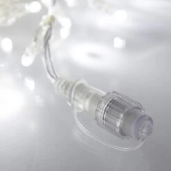Core Connect 20m 640 White Connectable Icicle Lights Clear Cable 11 Core Connect 20m 640 White Connectable Icicle Lights Clear Cable -Holiday Decor Shop ML64WC White LED Icicle christmas Light connection close P6 208265f2 e681 43c6 97f3 7a1e9f4e2f88