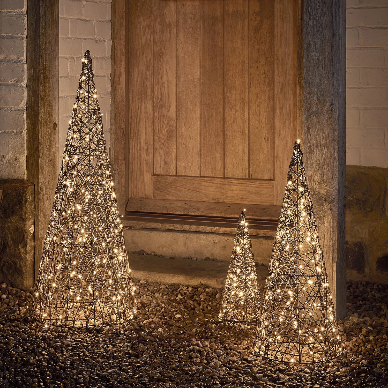 Studley Rattan Cone Outdoor Christmas Decoration Trio 2 Studley Rattan Cone Outdoor Christmas Decoration Trio - Image 2